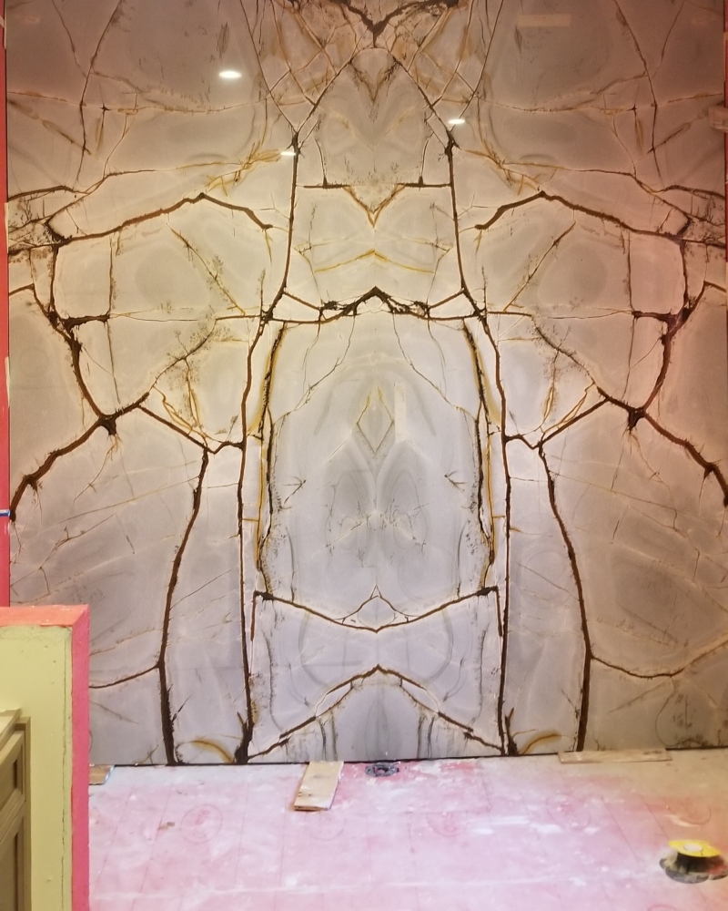 Custom granite shower pan and wall system