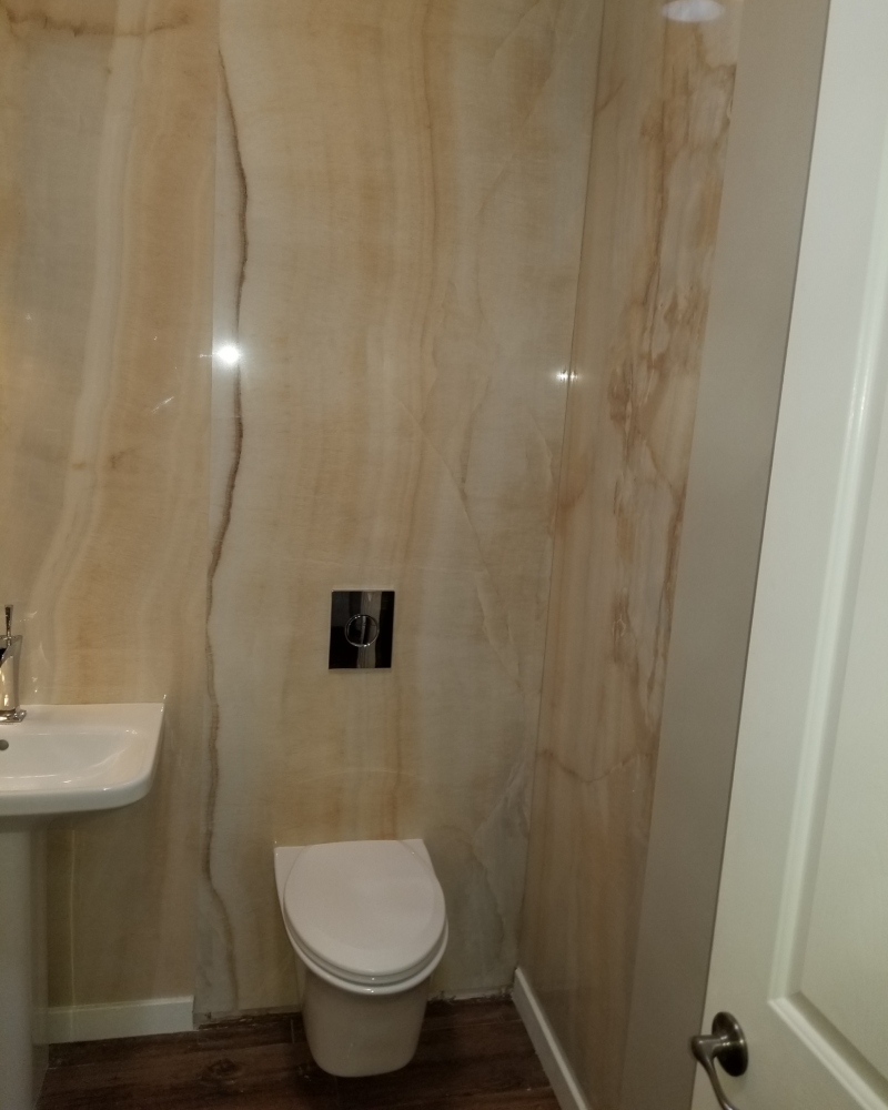 Spa-like granite and porcelain shower experience